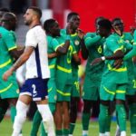 Senegal players celebrate